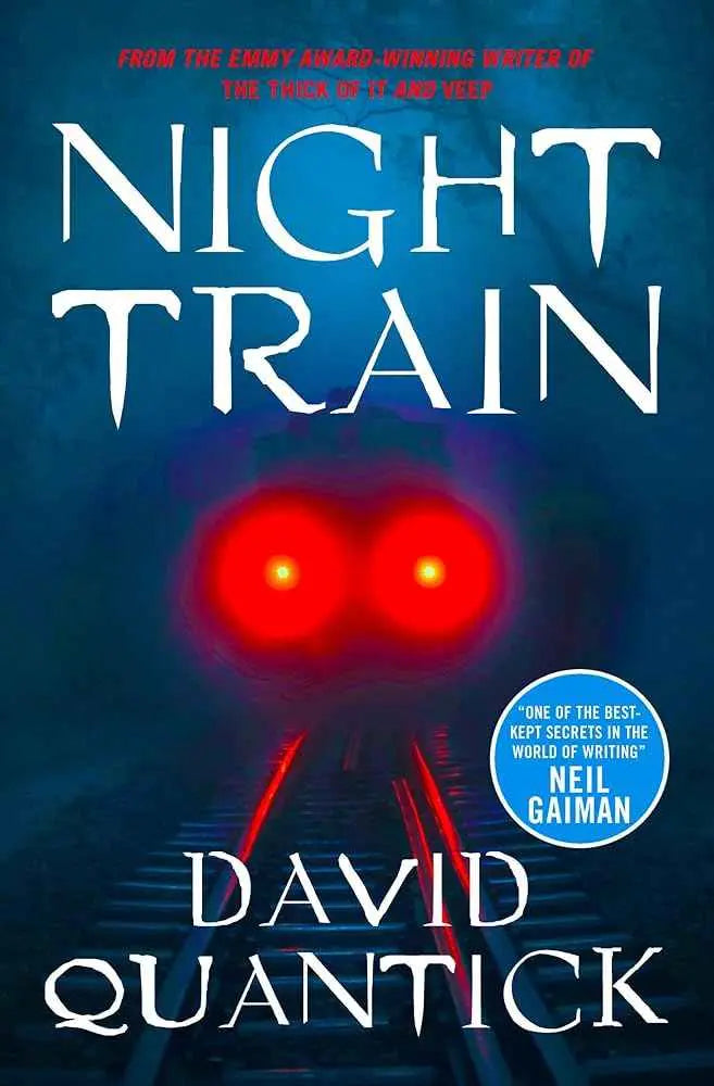Night Train book by David Quantick, featuring a cover with a dark train illustration, displayed in a close-up shot.
