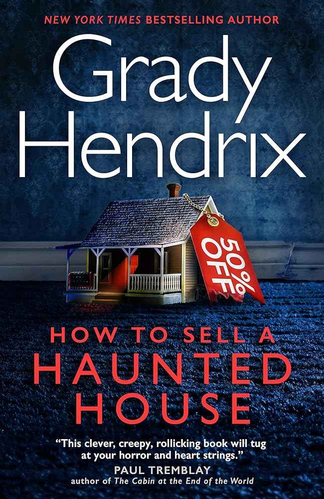 Hardback copy of "How to Sell a Haunted House" by Grady Hendrix, featuring the book cover with spooky haunted house illustration.