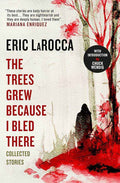 Hardback copy of "The Trees Grew Because I Bled There" by Eric LaRocca, dark fiction horror novel with a black cover and white text.