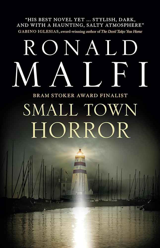 Hardback copy of Small Town Horror: Friendship Secrets Unraveled in Kingsport by Ronald Malfi, featuring eerie cover art.